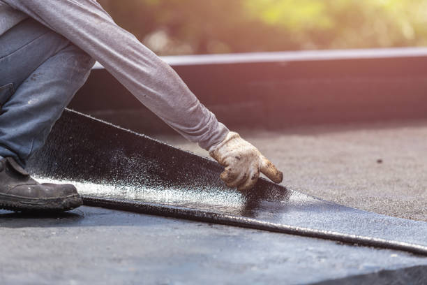 Professional Waterproofing technician working in Hudson, MI